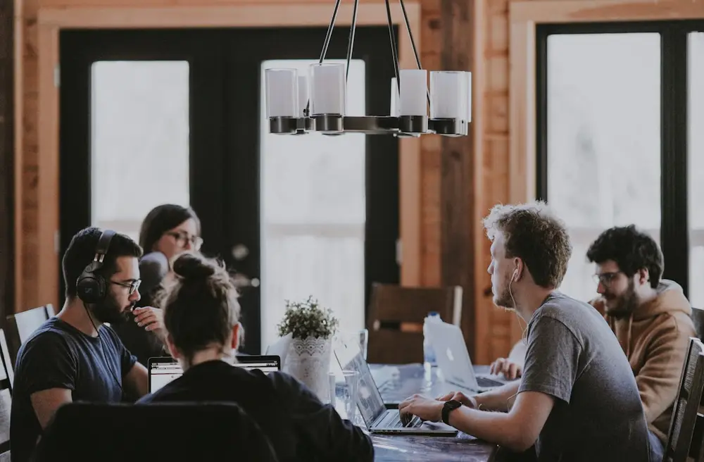 The AI Ads HQ team collaborating on client campaigns